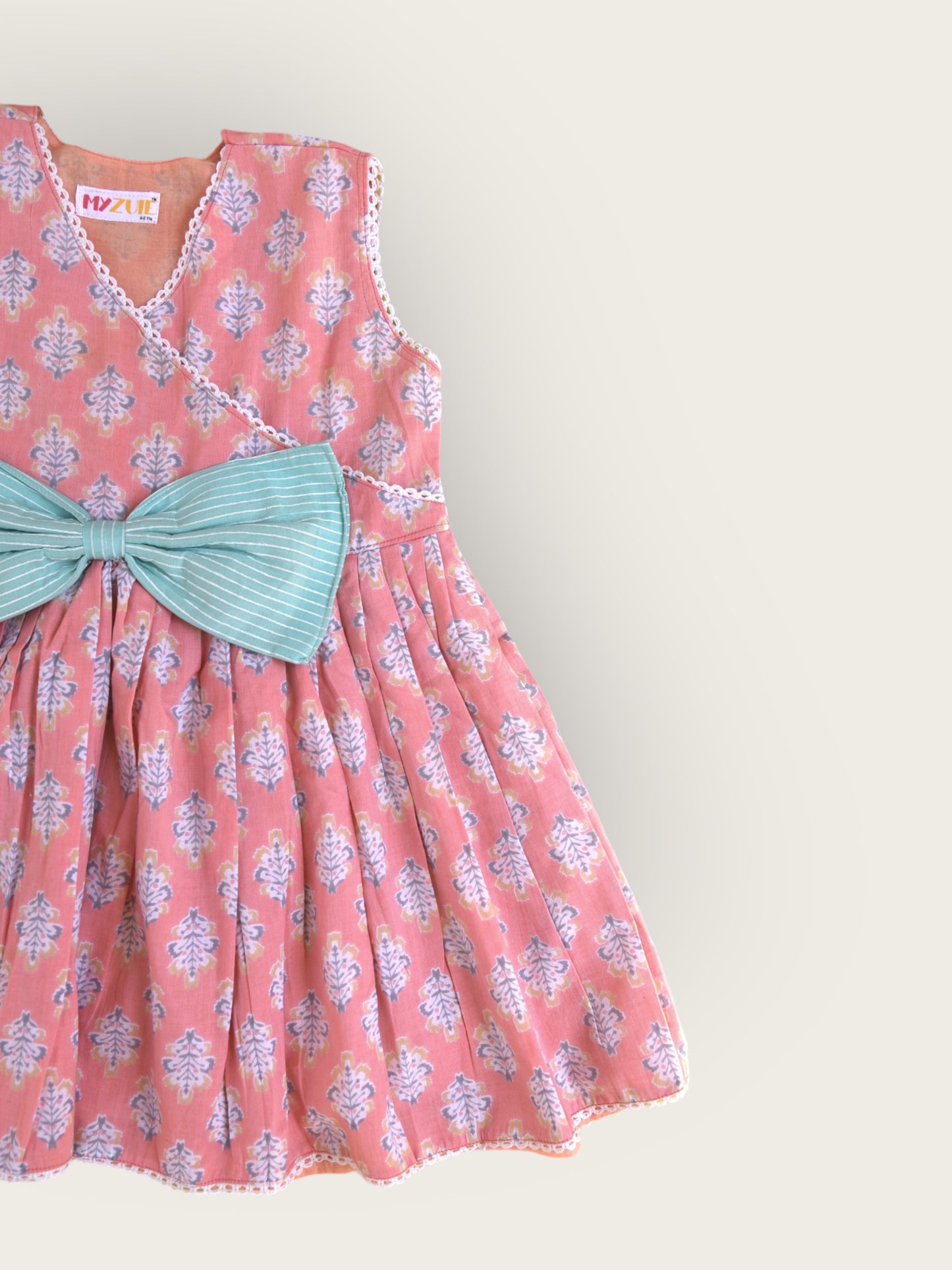 Girls Peach Angrakha Sleeveless Dress With Oversized Bow