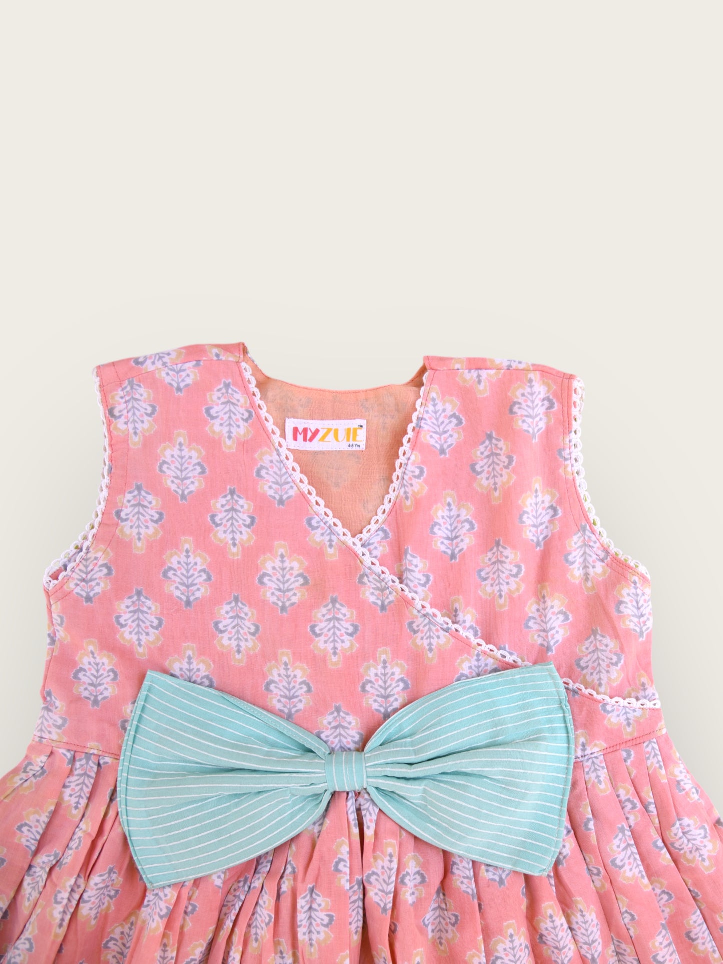 Girls Peach Angrakha Sleeveless Dress With Oversized Bow